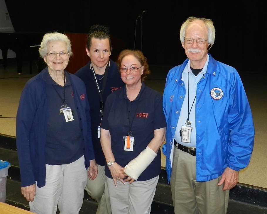 Kathi Galbasin (center) and her training team