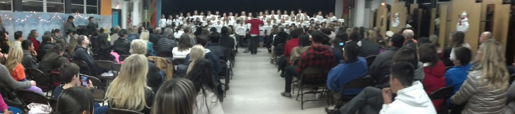 A packed and enthralled audience enjoying the Riviera and Richardson choruses